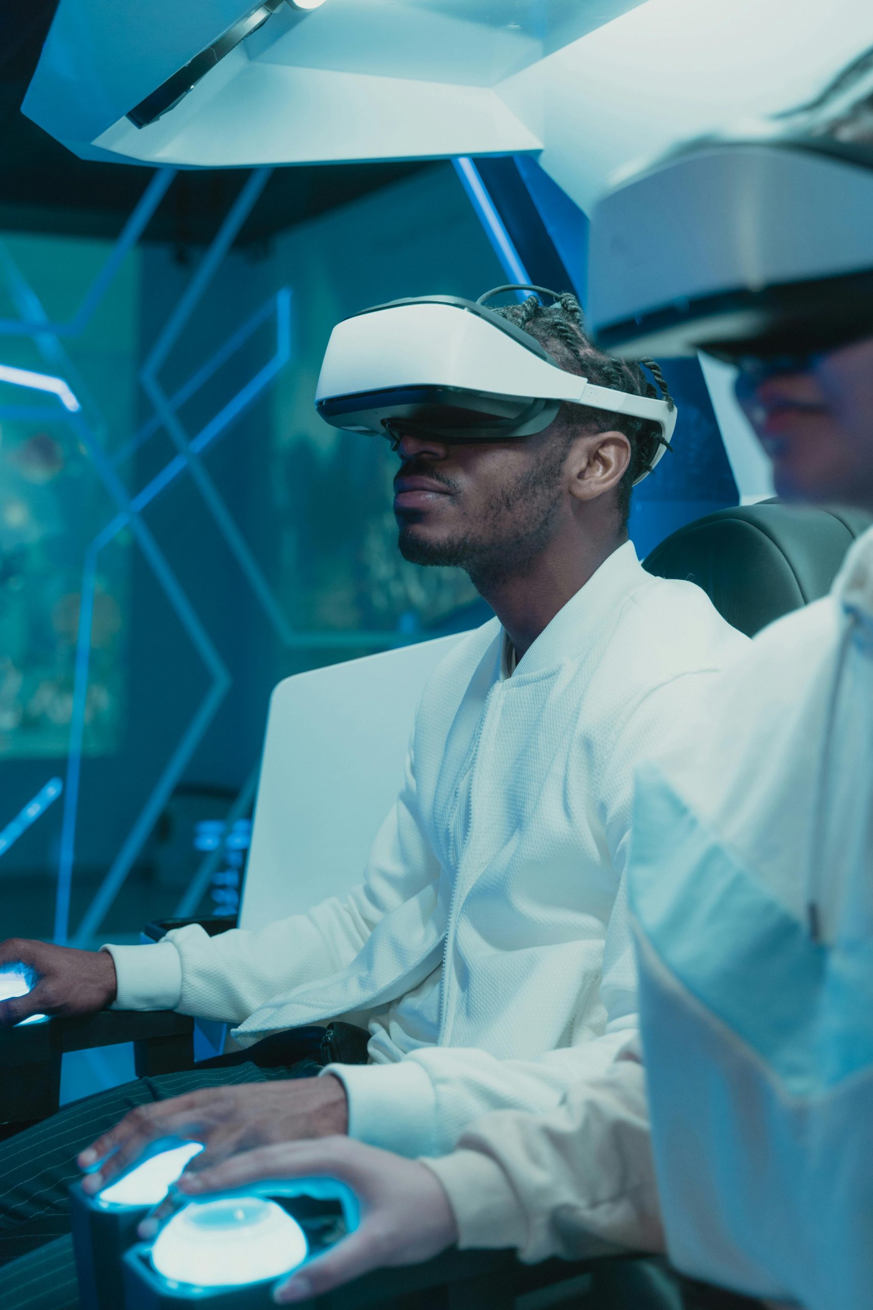 Man immersed in the Metaverse: A person exploring a virtual reality world with a VR headset, showcasing the future of digital interaction and virtual experiences