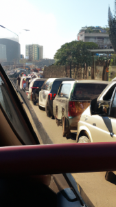 Vehicles jammed in heavy traffic on a busy Nairobi road, with cars stretching into the distance under a clear sky. The scene captures the hustle and bustle of the city, with impatient drivers and congested lanes characteristic of rush hour in the Kenyan capital